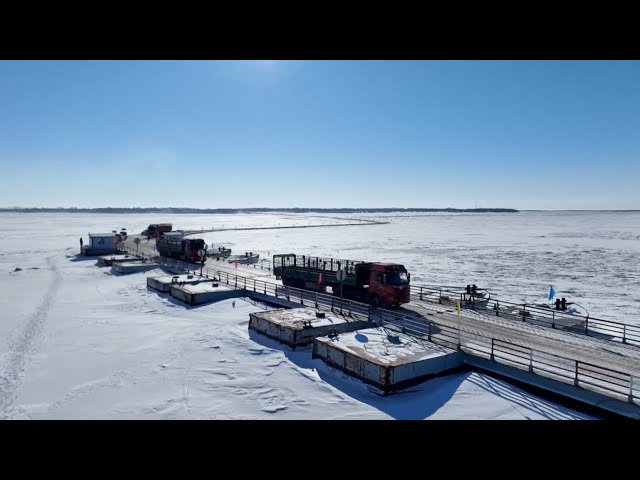 Seasonal freight pontoon bridge linking China to Russia reopens