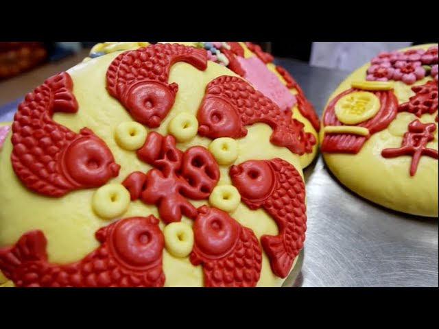 Sales of festival-themed buns boom ahead of Chinese New Year