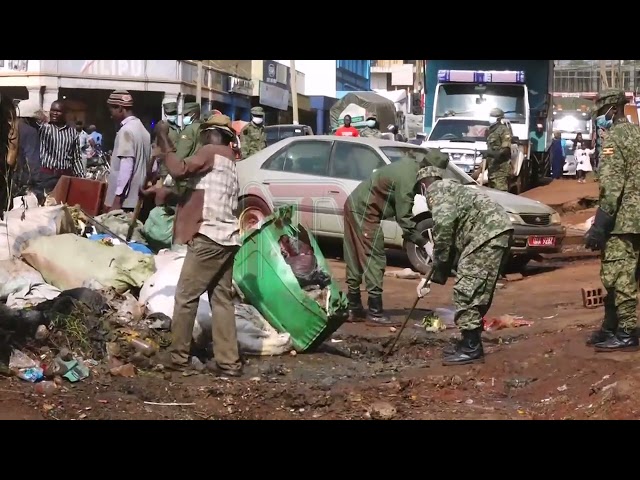 UPDF soldiers clear heaps of garbage in Jinja city