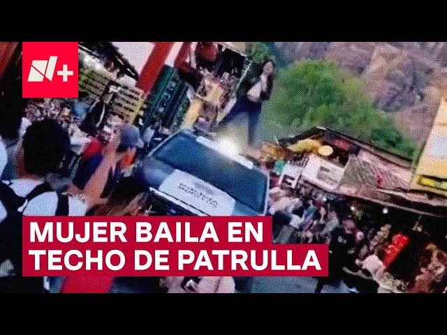 Mujer se sube a bailar al techo de una patrulla - N+