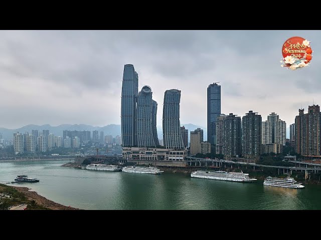 Live: A view of Chongqing's skyline and Chaotianmen Port