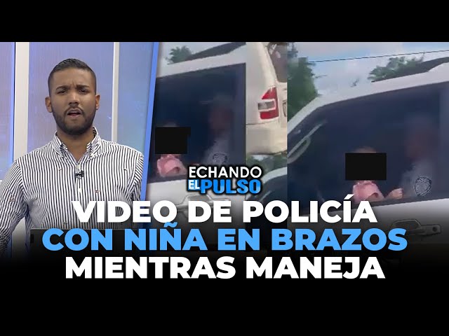 Este policía con una niña en brazos manejando en la Autopista Duarte | Echando El Pulso