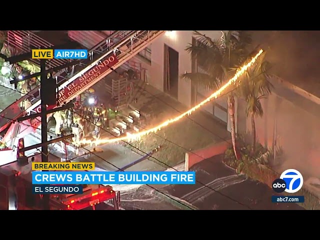 Power line sparks, catches fire as crews battle flames at El Segundo business