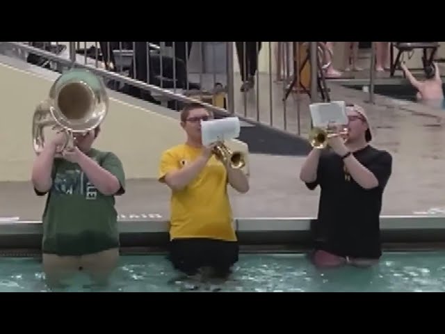 High school band plays in the pool for epic show of school spirit