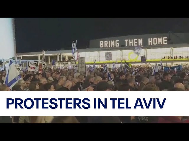 Anti-government protesters march in Tel Aviv