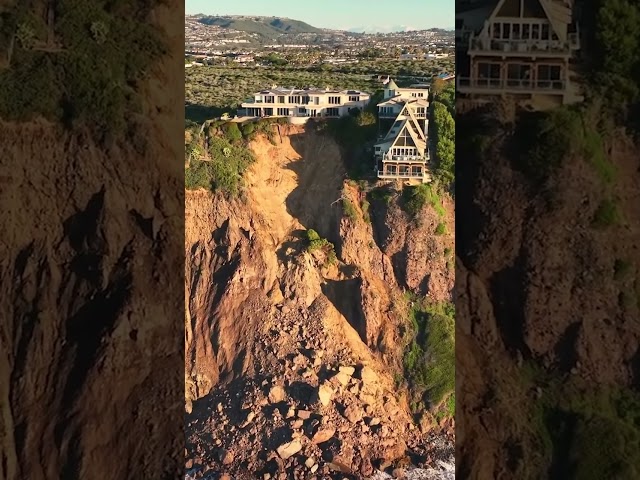 Drone video: Landslide leaves mansions on the edge of a cliff #Shorts