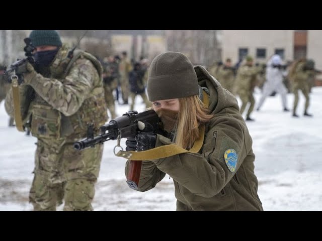 Women in Ukraine prepare for combat in military training sessions