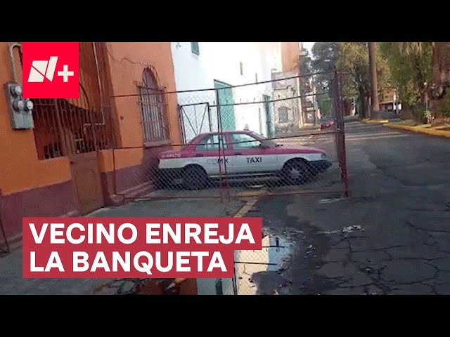 Exhiben a vecino por convertir banqueta en estacionamiento - N+