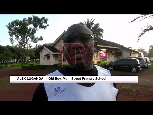 Jinja's main street primary Alumni run for asbestos-free roofing