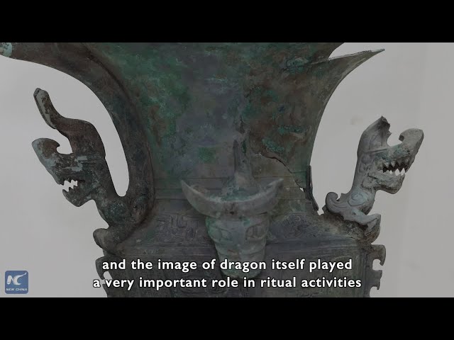 GLOBALink | Chinese dragon in their eyes: archaeologists and animation artist