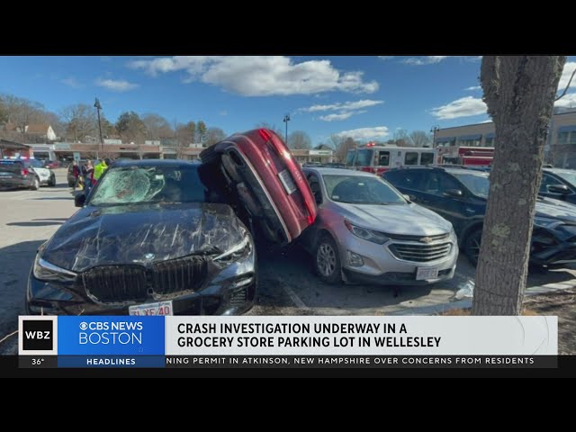 Car gets wedged between SUVs in Wellesley parking lot crash