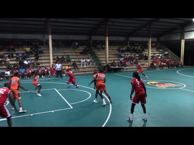 SPECTATORS ENTHRALLED BY DIVISION ONE BASKETBALL ACTION