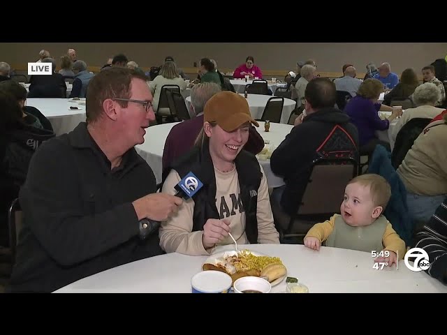 Dave Rexroth talks to family at fish fry