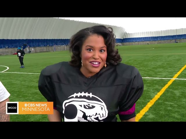 Women's tackle football team runs drill with WCCO anchor