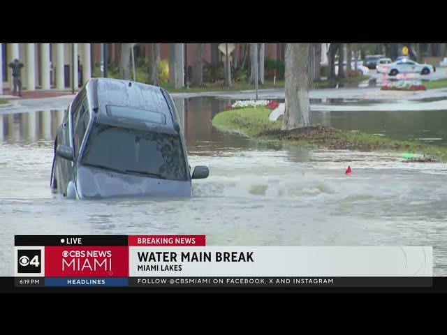 Water main break floods Miami Lakes street