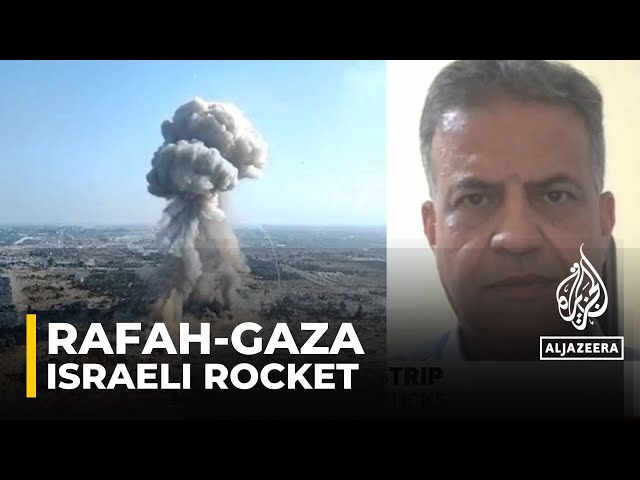 Israeli forces have fired a warning rocket that targeted a car carrying Al Jazeera crew in Rafah