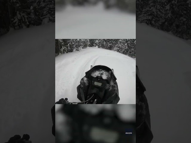 Watch: Moment snowmobiler is temporarily buried in avalanche #Shorts