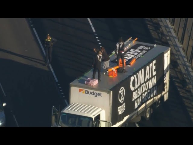 Climate activists blocking traffic on Melbourne bridge