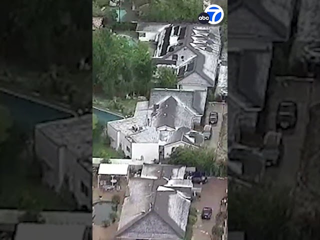 VIEW FROM THE SKY: Hail falls on homes in Tarzana