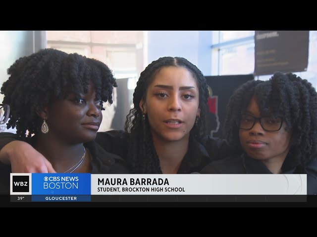 High school students present their solutions to economic problems at Northeastern