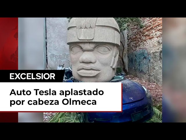 Auto Tesla fue aplastado por cabeza Olmeca en la Roma, CDMX, ¿qué se sabe?