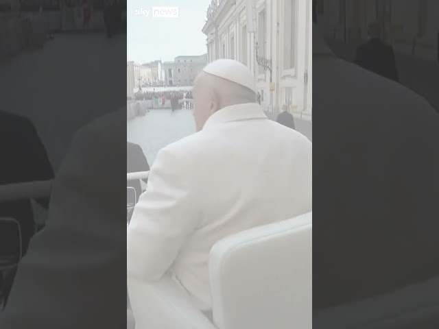 Moment Pope's hat blows off