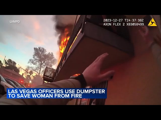 Woman rescued from burning building by police officers in Las Vegas