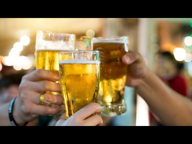 Group of nuns serve pints of beer in Spain