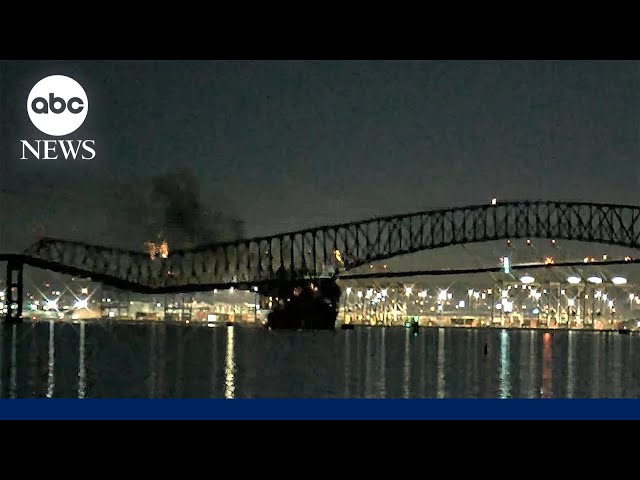 Moment a massive cargo ship crashes into and causes near-total collapse of Baltimore bridge