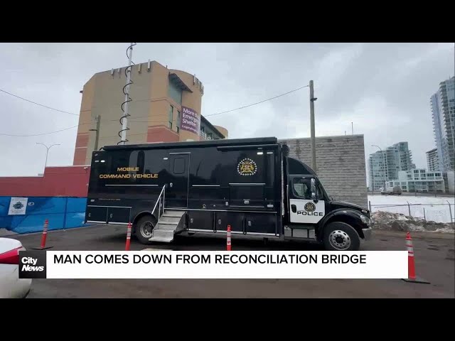 Man comes down from Reconciliation Bridge