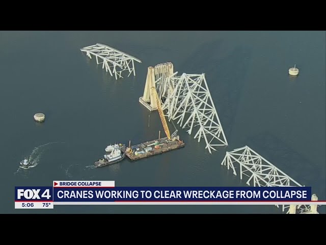 Baltimore bridge collapse: Cranes work to clear wreckage from harbor