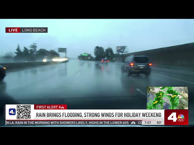 Overnight downpours raise flood threat on LA roads