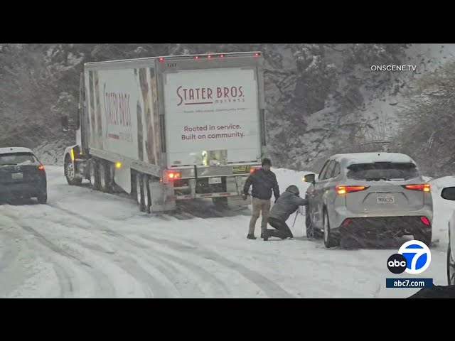 Dozens of vehicles get stuck in snow near Running Springs