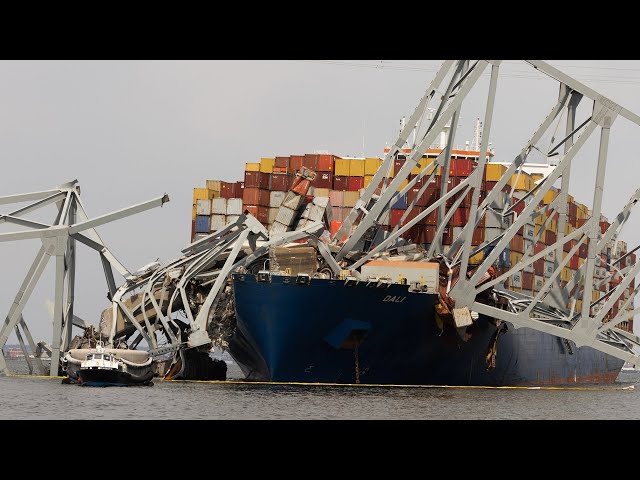 Crews cut apart Baltimore bridge wreckage, temporary channels being prepared for shipping