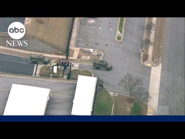 ⁣Driver rams car into gate of FBI Atlanta bureau