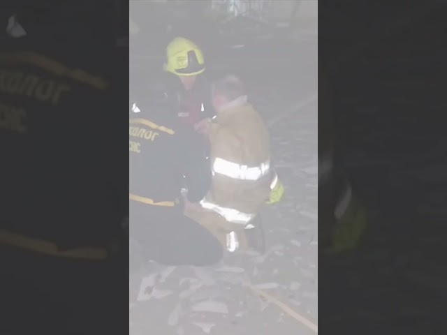 ⁣Firefighter cries after learning father was killed metres away