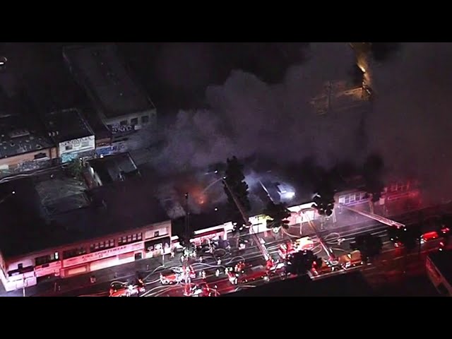 Firefighters battle blaze at sportswear store in downtown LA