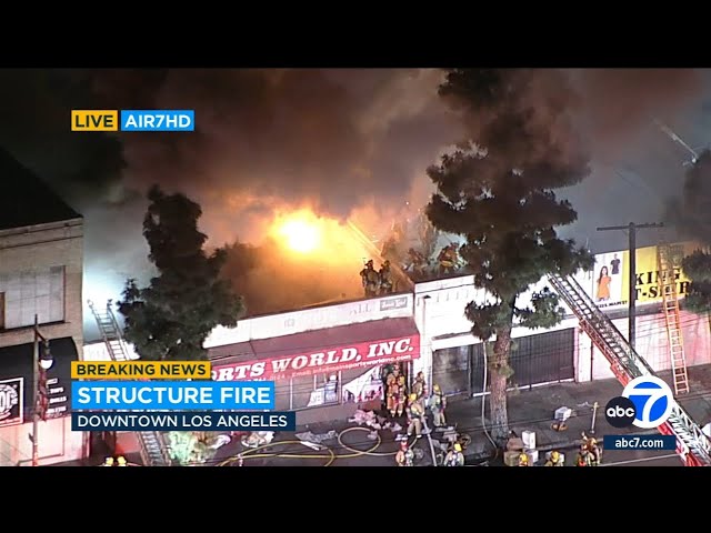 Dramatic fire erupts at commercial building in downtown LA's Fashion District