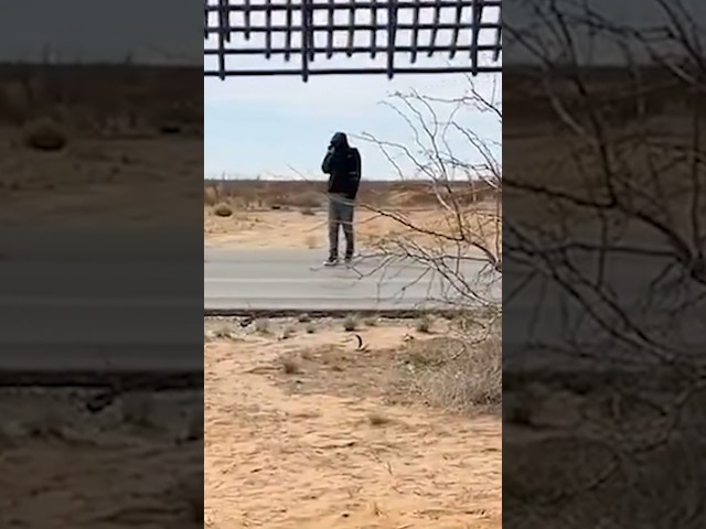 ‘Let us cross!’: Migrants try to get through US border wall