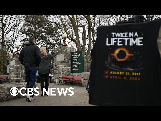 ⁣Watch Live: Solar eclipse view from Niagara Falls, New York | CBS News