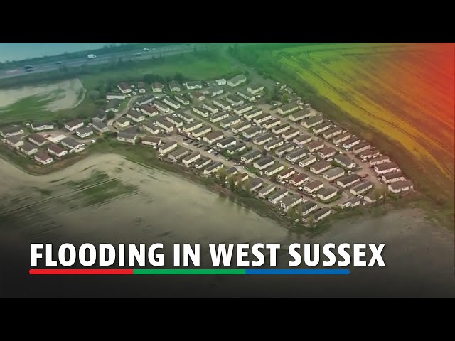 ⁣Holiday homes submerged in water as floods hit south east England | AB-CBN News