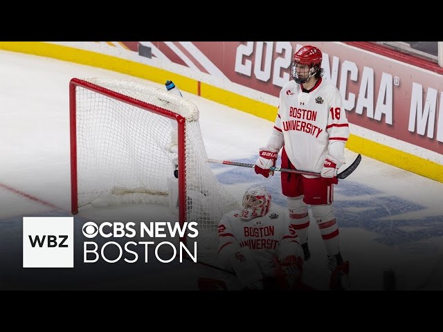 ⁣Boston University reacts after disappointing overtime loss to Denver in Frozen Four