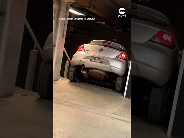 ⁣Motorist gets stuck in stairwell in Brazil garage