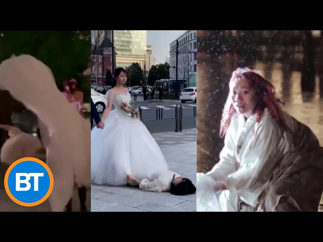 A wedding photographer’s assistant made it into the background of every shot
