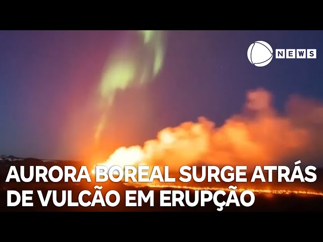 Aurora boreal surge atrás de um vulcão em erupção na Islândia