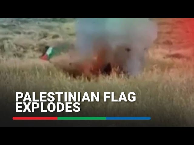 ⁣Palestinian flag explodes when Israeli man tries to remove it | ABS-CBN News
