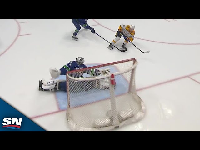 ⁣Canucks' Thatcher Demko Goes Post-To-Post For Unreal Pad Save