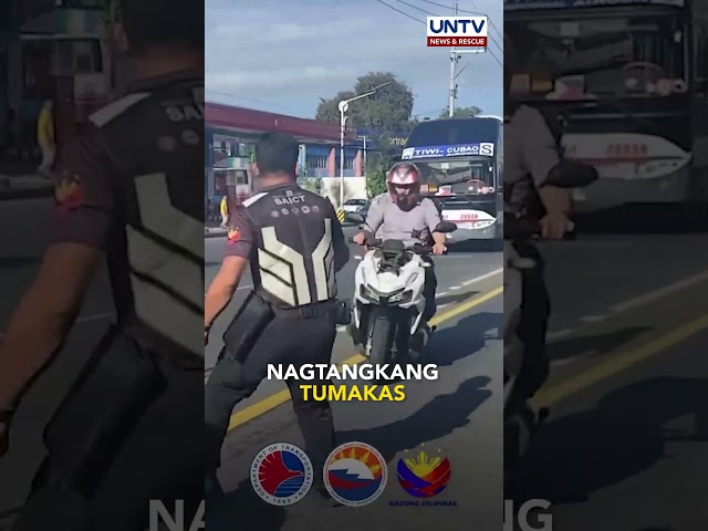 ⁣Rider na dumaan sa EDSA Busway, muntik makasagasa ng traffic law enforcers