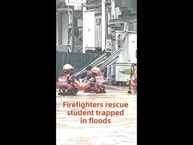 ⁣Firefighters rescue student trapped in floods