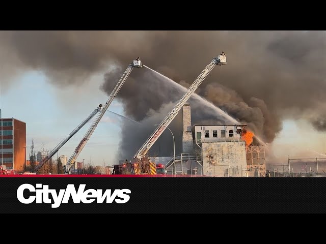 ⁣‘Suspicious’: Edmonton police investigate historic hangar fire